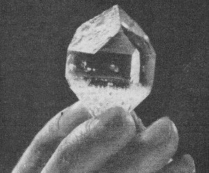 A quartz crystal.  That's a hand holding it.