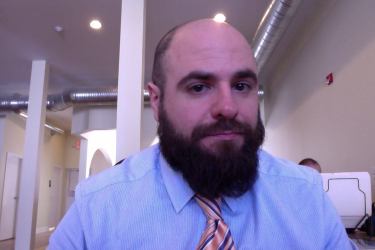 Dr. Kevin Thurston, expert in men's feelings, shortly before he fell on his wrist.