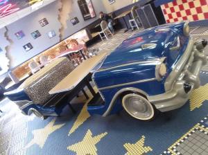 Retro automobile booth. Note the man crying in the background.