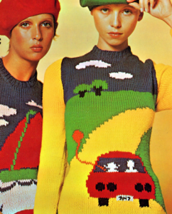 Sweaters with vehicles on them.